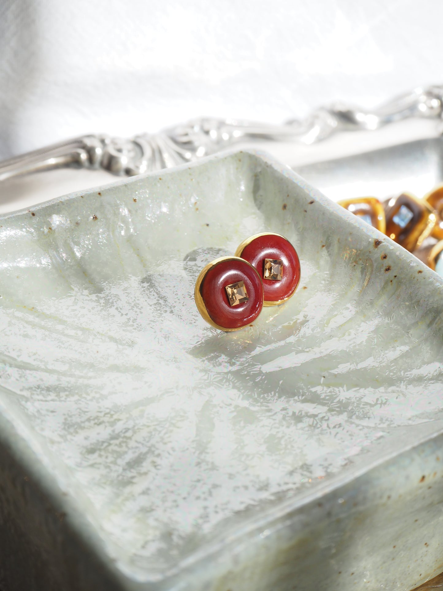 “Bigger Supernova”  Mahogany Brown Large Handmade Porcelain Studs with 24k Gold lustre rims and an Swarovskis Crystal