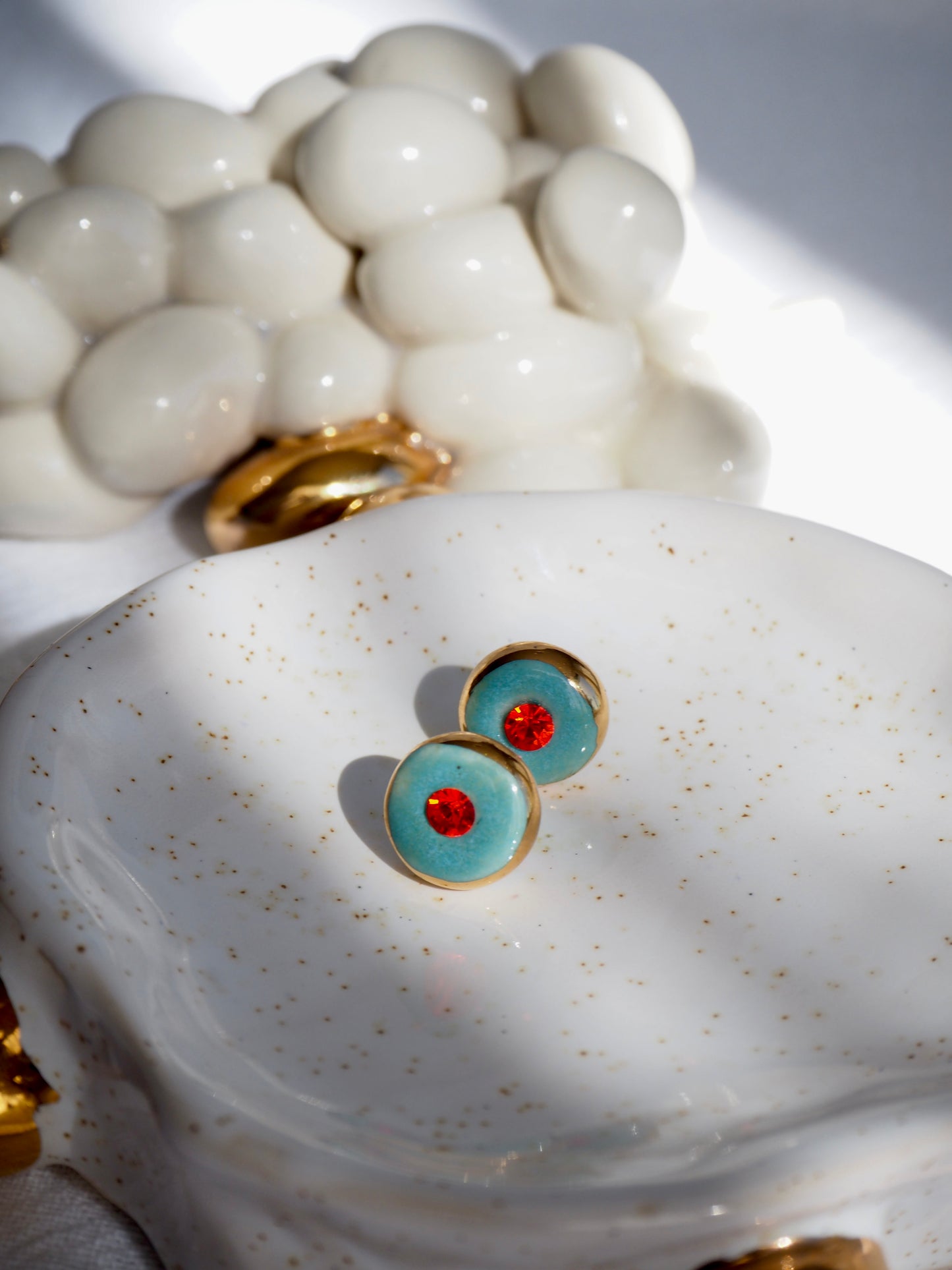 “Supernova” Aqua Green Small Handmade Porcelain Studs with 24k Gold lustre rims and Swarovskis Crystal.