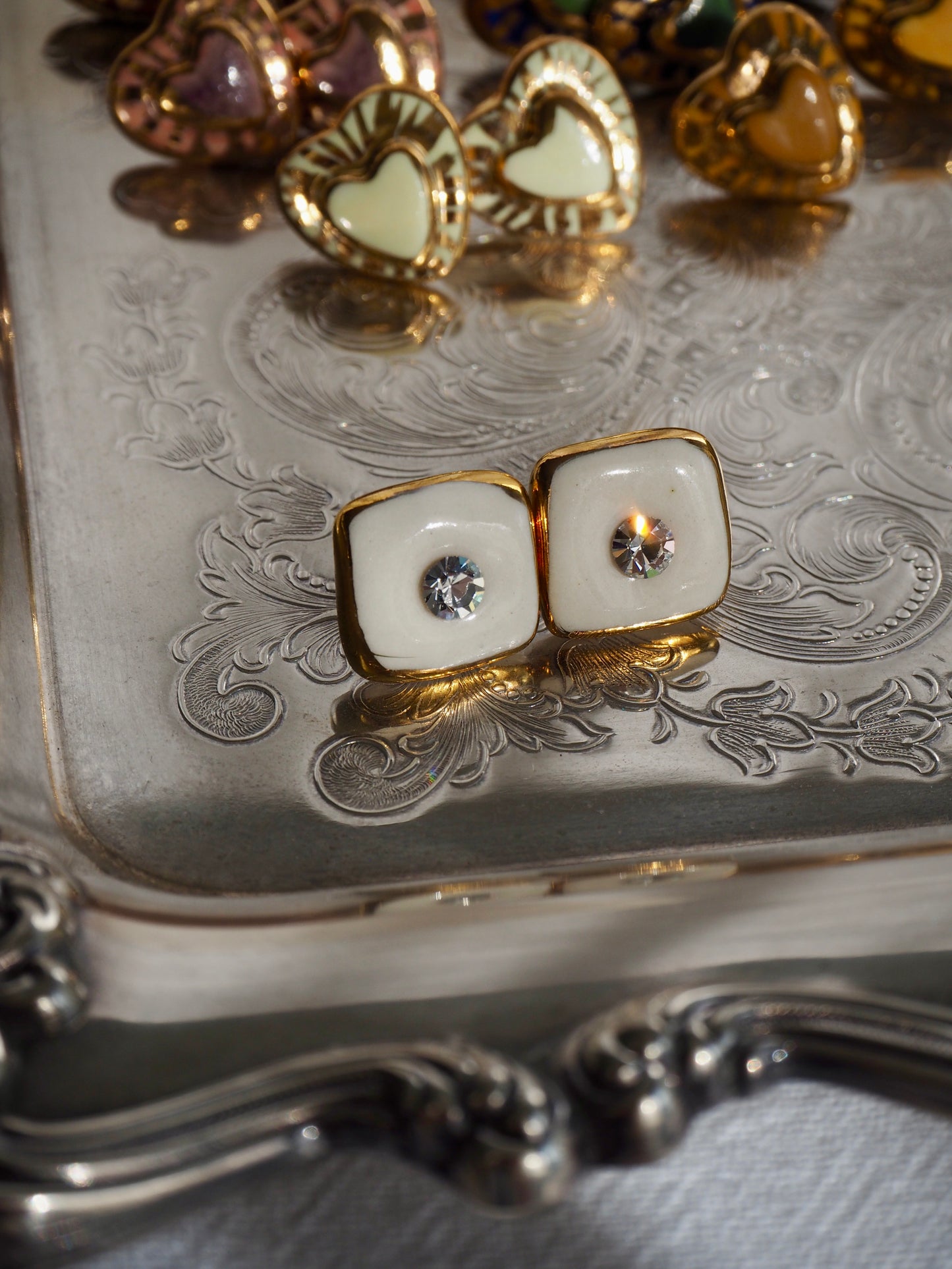 “Bigger Supernova” White Large Handmade Porcelain Studs with 24k Gold lustre rims and an Swarovskis Crystal