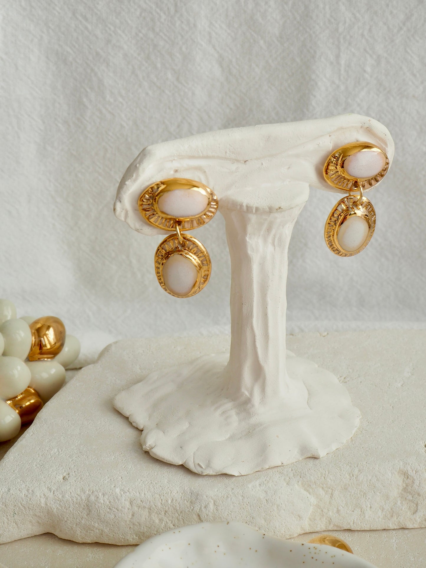 Coconut “Anima” Handmade Porcelain Earrings with Parchment underglaze under Faded White coloured glaze with 24k gold lustre rays