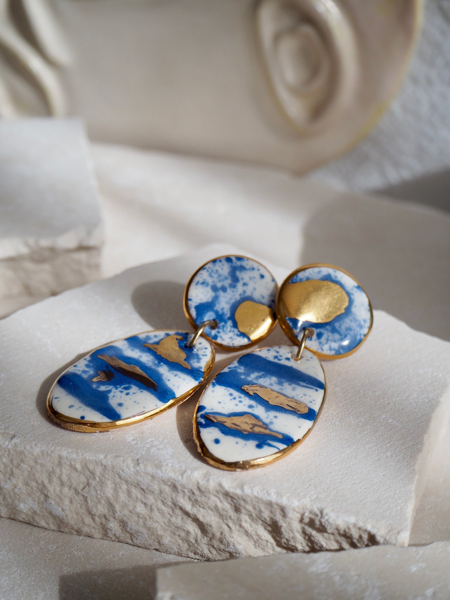 Royal Blue & White Splatter Porcelain Earrings coloured using ceramic stain under clear glaze for glossy look