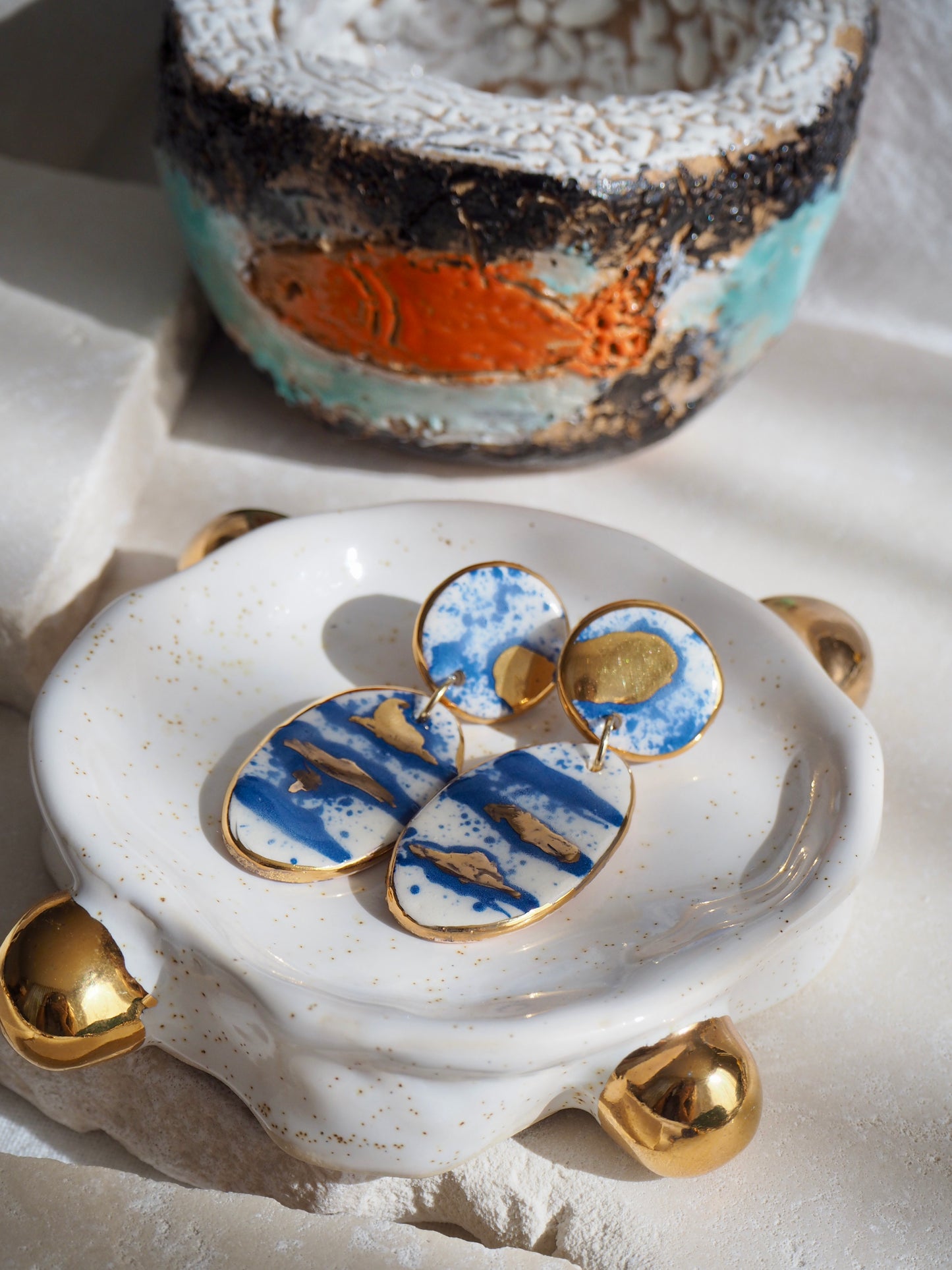 Royal Blue & White Splatter Porcelain Earrings coloured using ceramic stain under clear glaze for glossy look