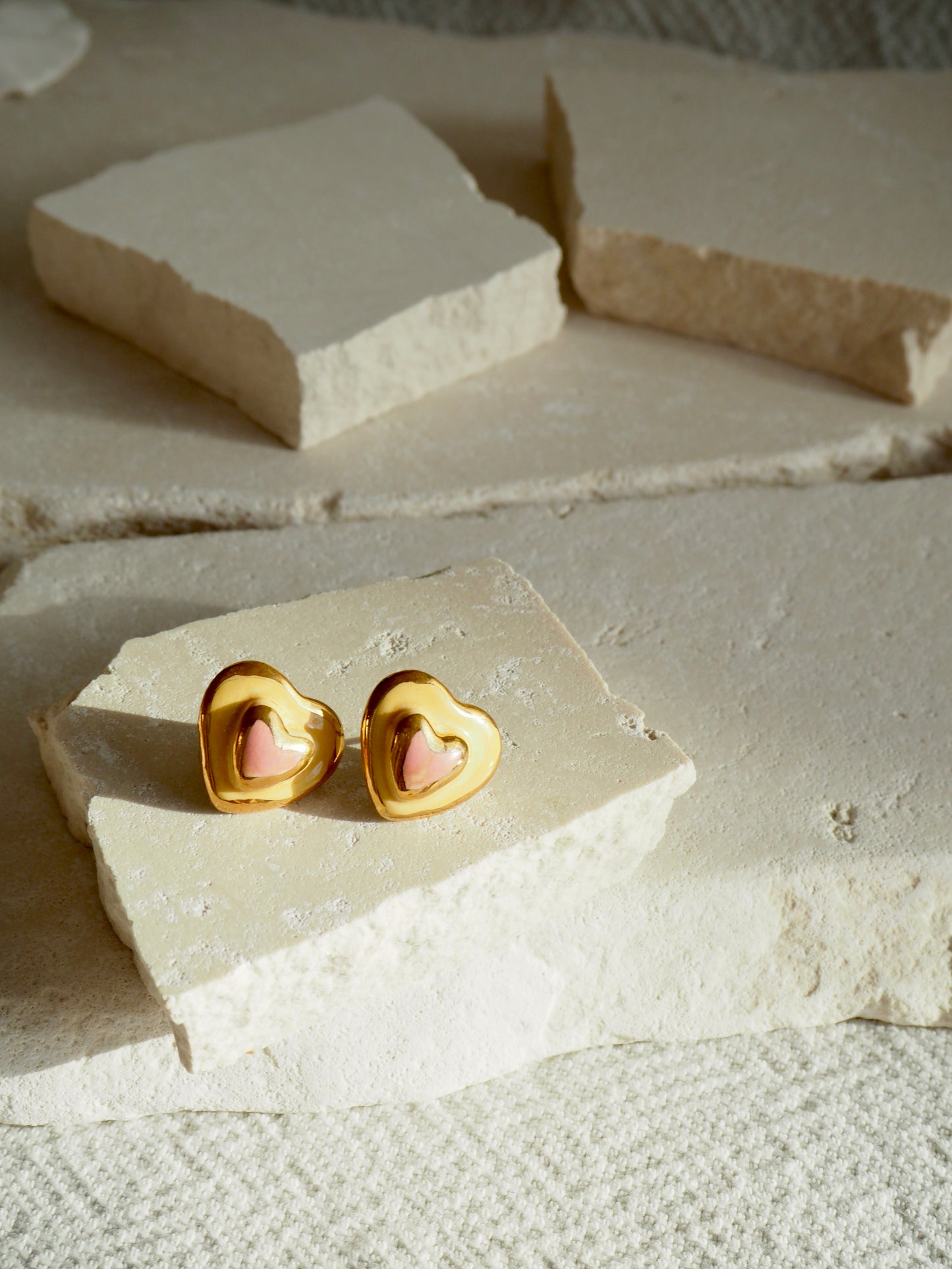 Small Handmade Porcelain Heart Stud coloured with “Light Pink&Orange” glossy glazes with 24k Gold lustre details