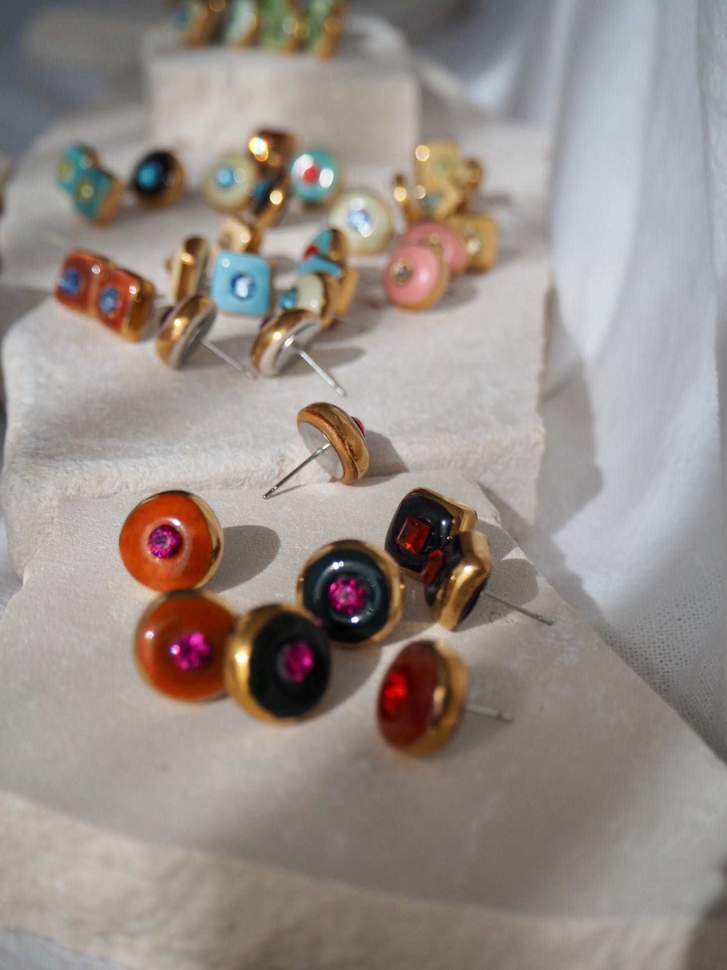 “Supernova” Brown Small Square Handmade Porcelain Studs with 24k Gold lustre rims and Swarovskis Crystal.