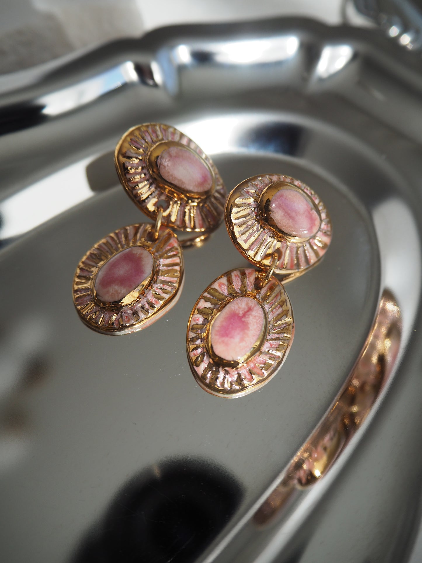 “Anima” Fused Pink coloured glazes creating a Marbled look with 24k gold lustre rays