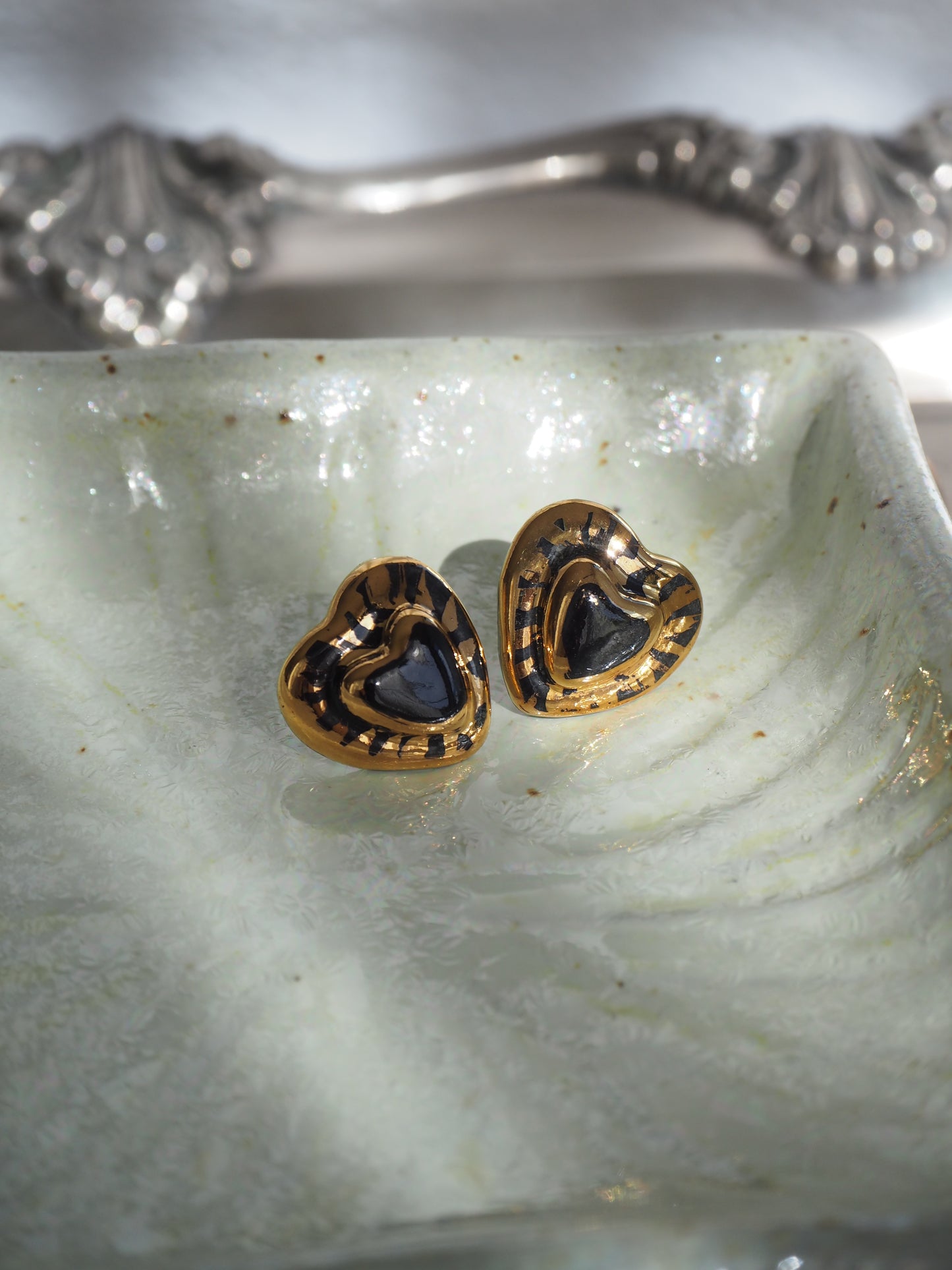 Small Handmade Porcelain Heart Stud coloured with “Black” glossy glaze with 24k Gold lustre rays