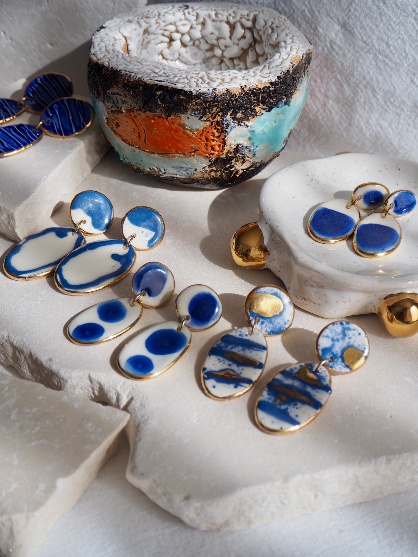 Royal Blue & White Splatter Porcelain Earrings coloured using ceramic stain under clear glaze for glossy look