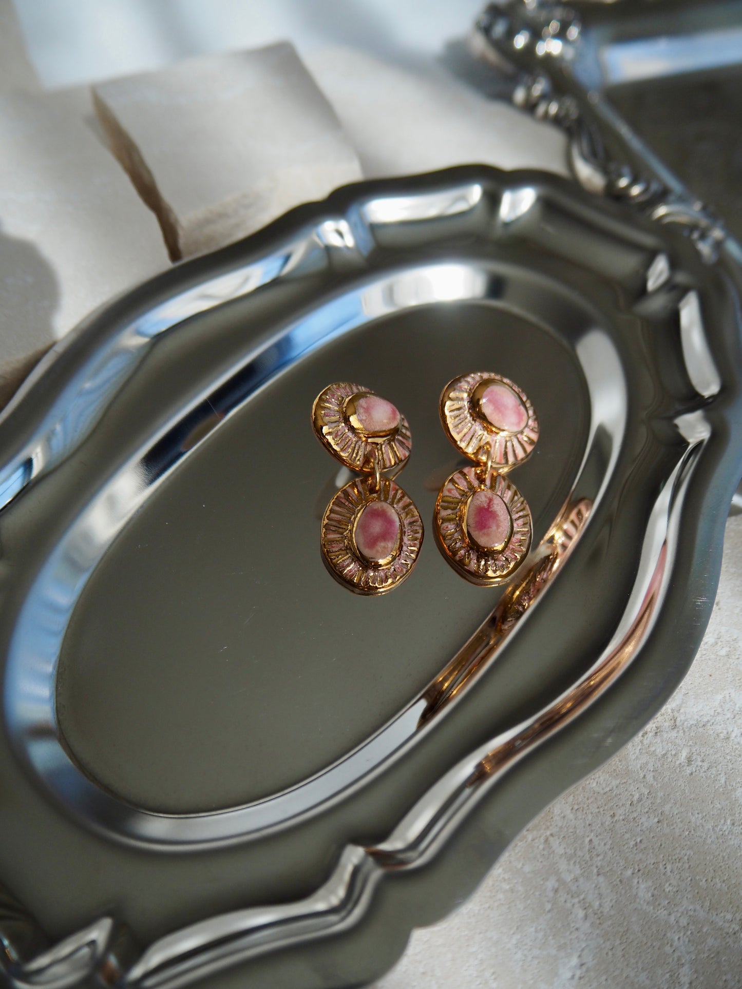 “Anima” Fused Pink coloured glazes creating a Marbled look with 24k gold lustre rays