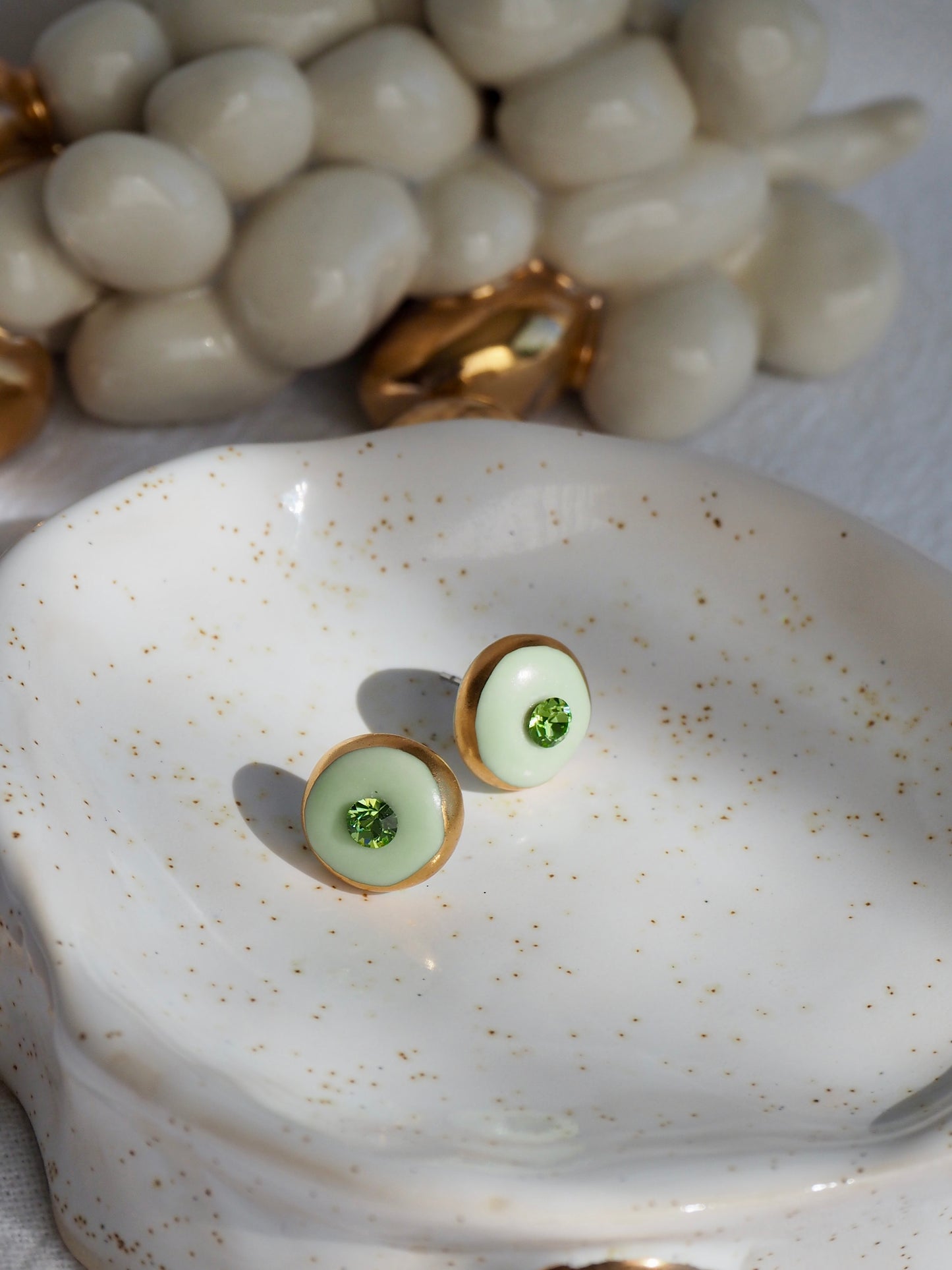 “Supernova” light Sage Green Small Handmade Porcelain Studs with 24k Gold lustre rims and Swarovskis Crystal
