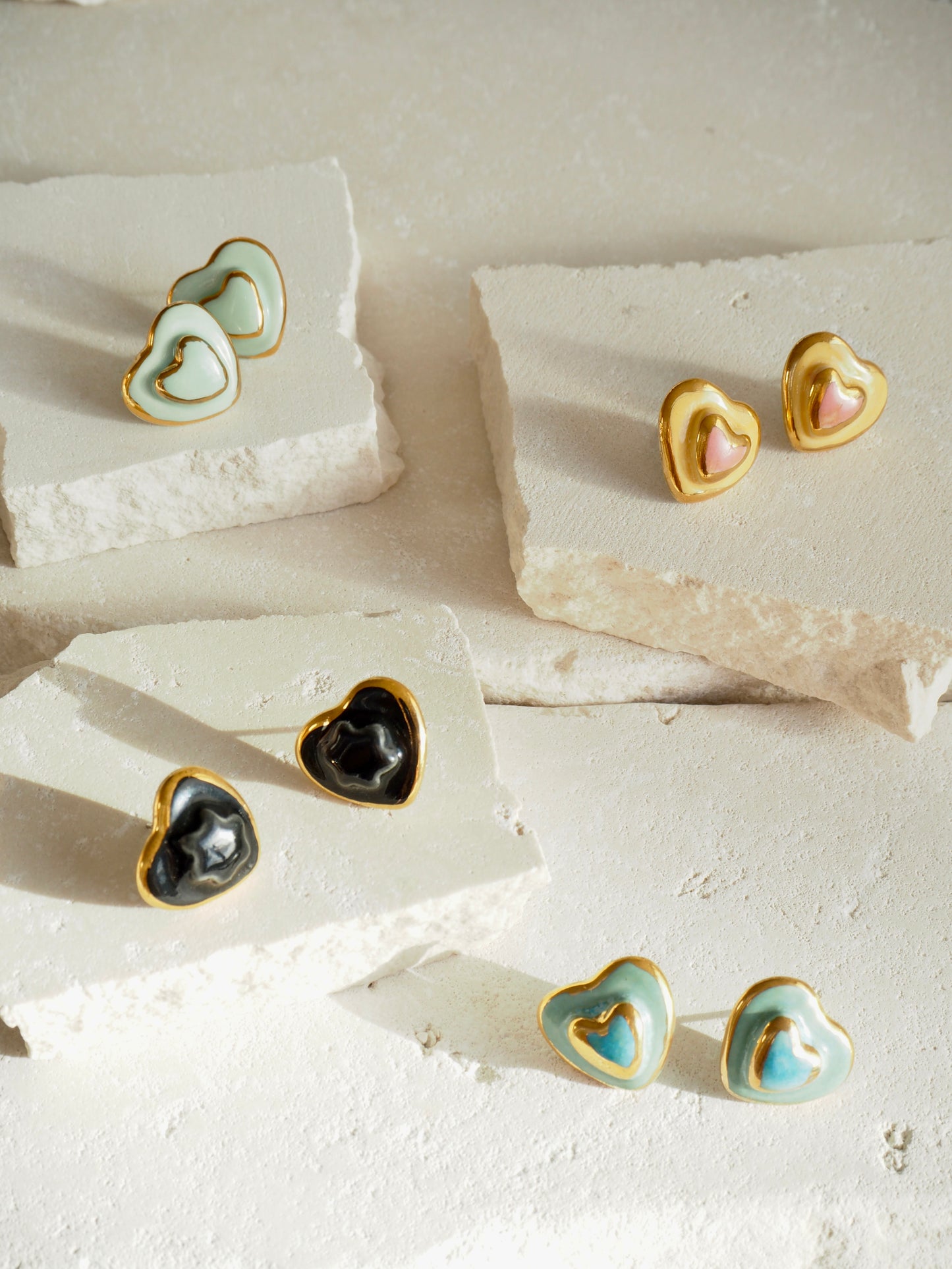 Small Handmade Porcelain Heart Stud coloured with “Blues and Greens” glossy glazes with 24k Gold lustre details