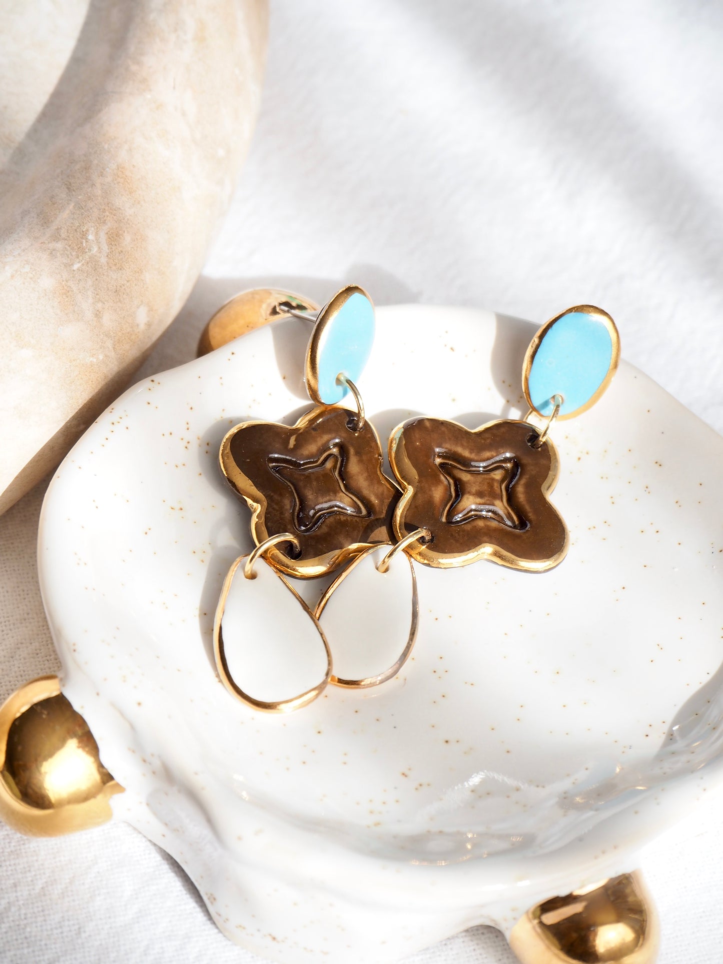 “A Feast for your Eyes” Handmade Porcelain Earrings in Blue, Brown and White glossy coloured glazes with 24k gold lustre details.