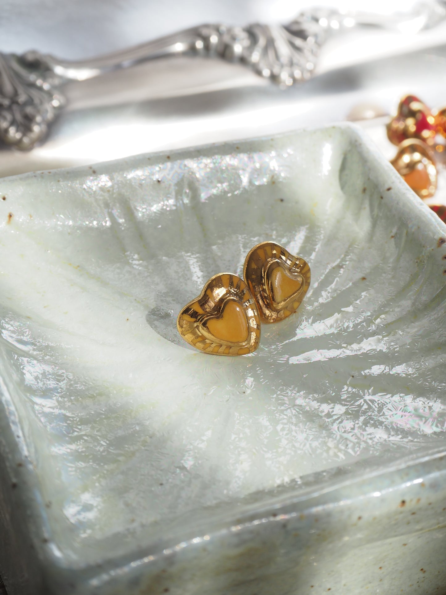 Small Handmade Porcelain Heart Stud coloured with “Mustard Yellow” glossy glaze with 24k Gold lustre rays