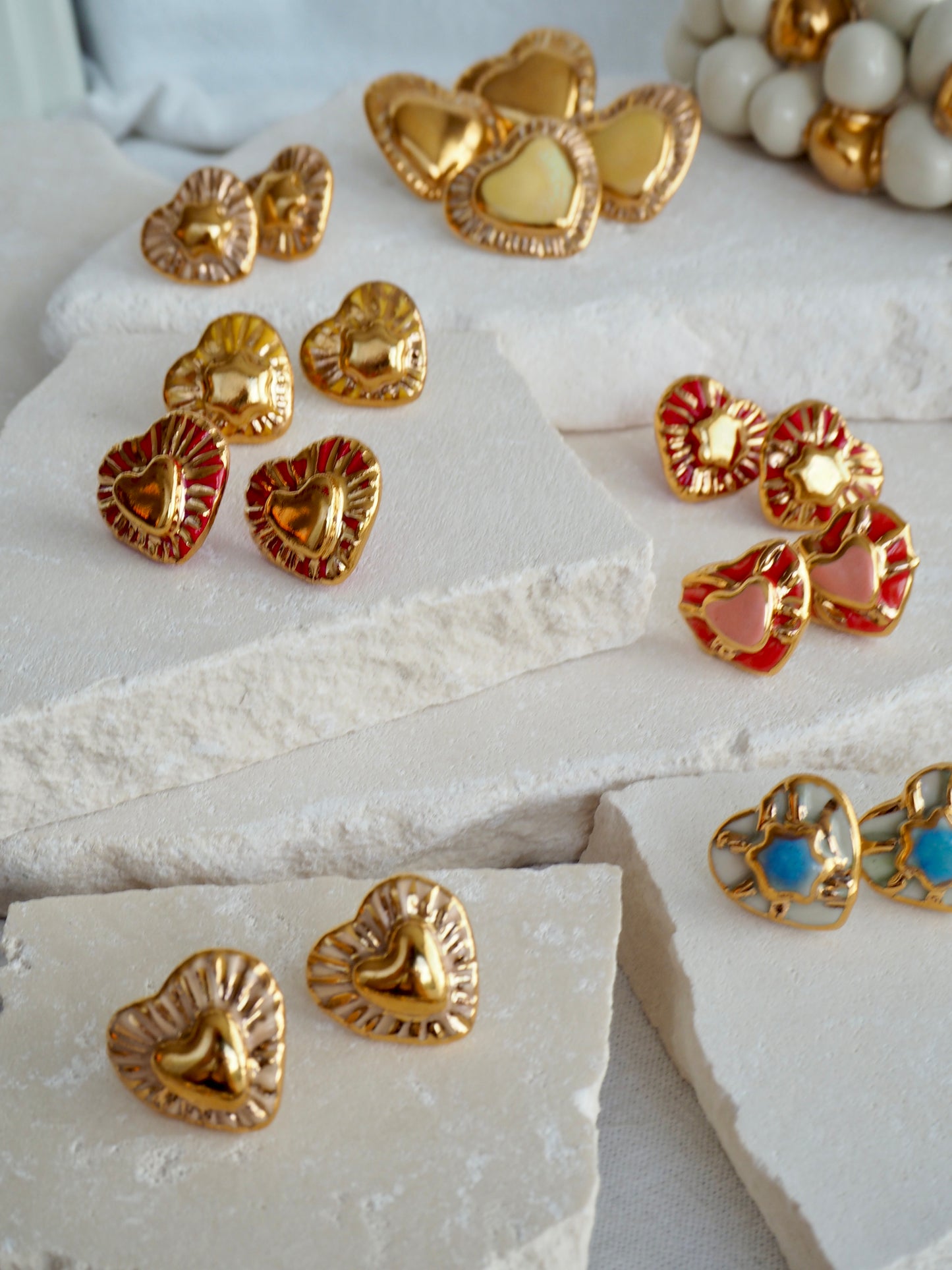 Small Handmade Porcelain Heart Stud Earrings coloured with Glossy Parchment coloured underglaze with 24k Gold lustre details and Gold center Star