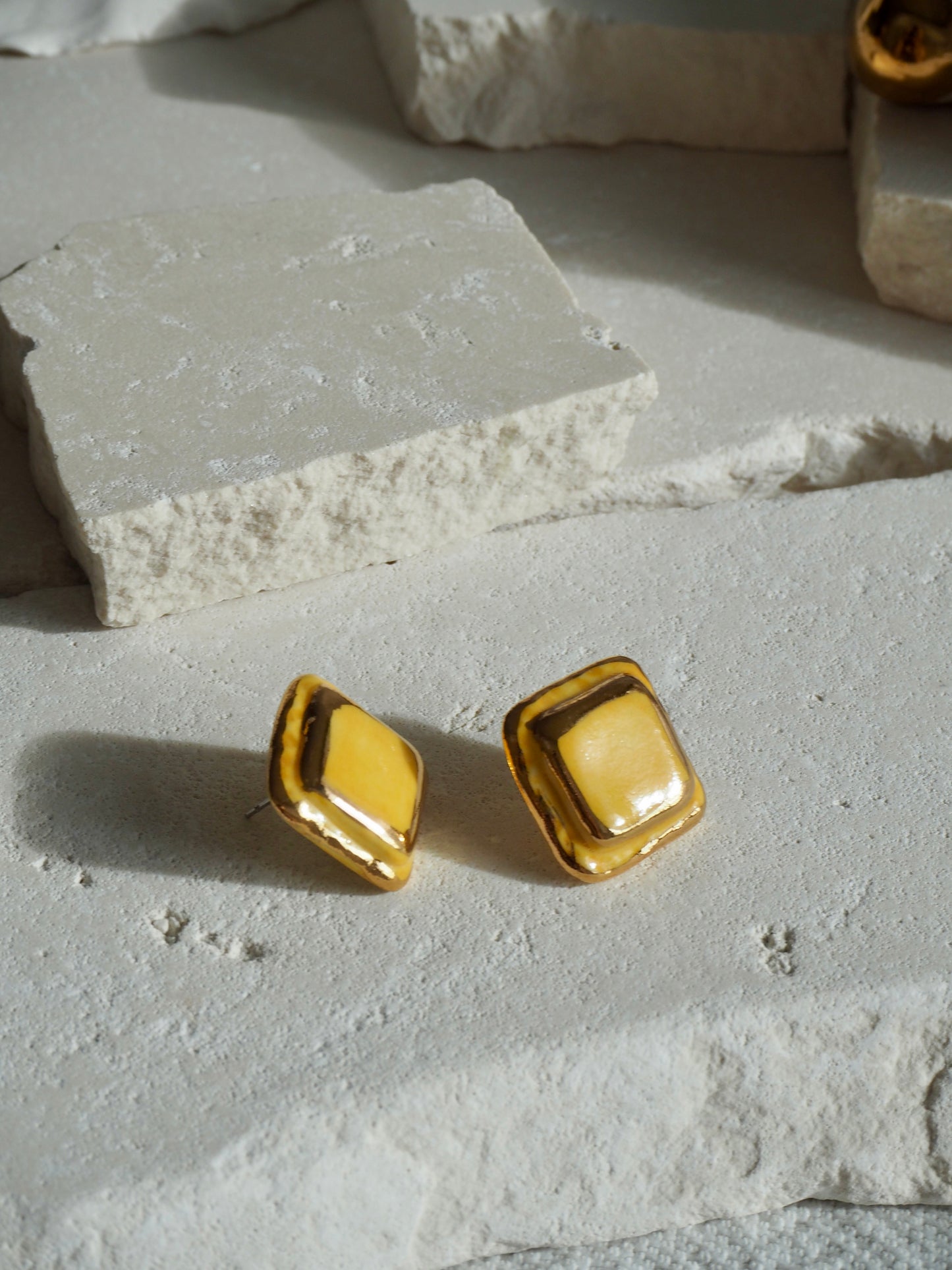 “il Quadrato” Medium Handmade Porcelain Studs coloured with “Yellow” glossy glaze with 24k Gold lustre details