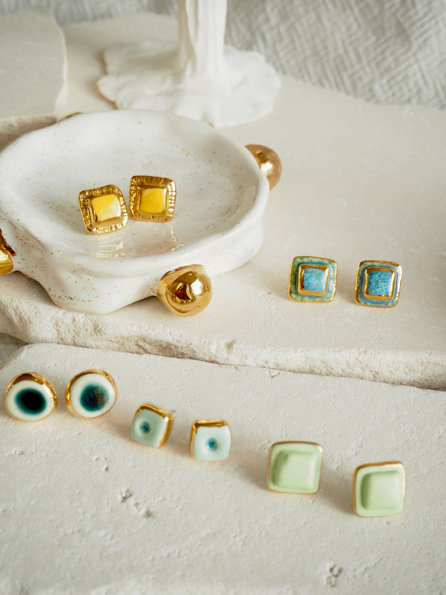 “il Quadrato” Small Handmade Porcelain Studs coloured with Shades of Aqua glossy glaze with 24k Gold lustre details