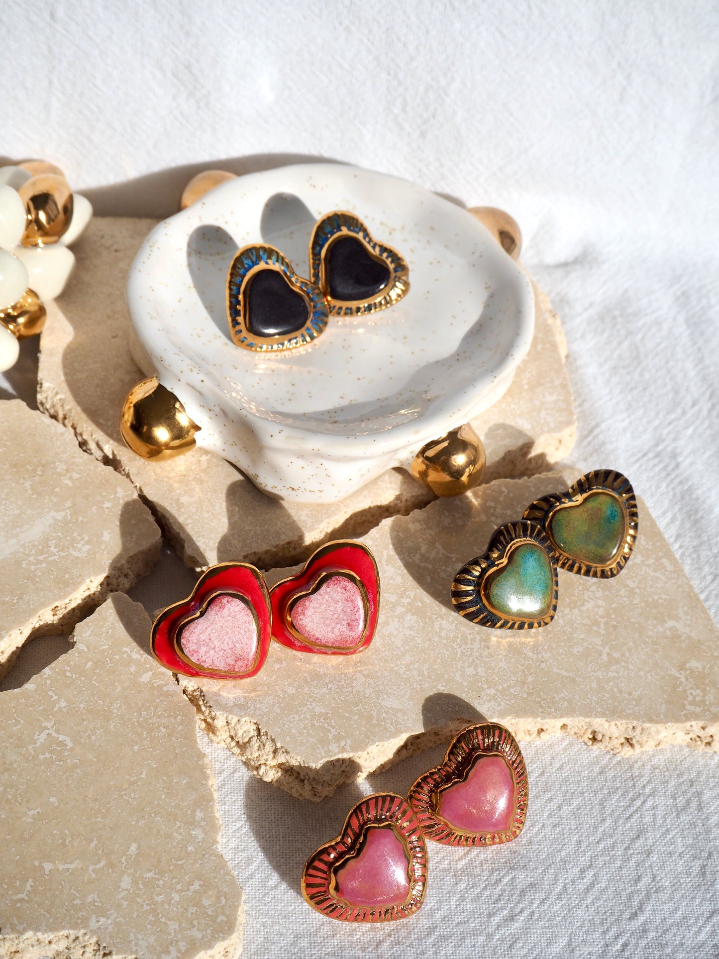 Black Clay Heart Earrings with blue glossy glazes & 24k Gold lustre rim
