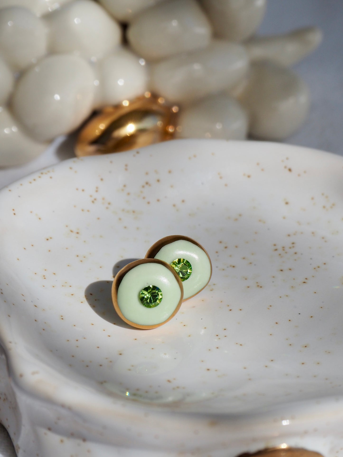 “Supernova” light Sage Green Small Handmade Porcelain Studs with 24k Gold lustre rims and Swarovskis Crystal