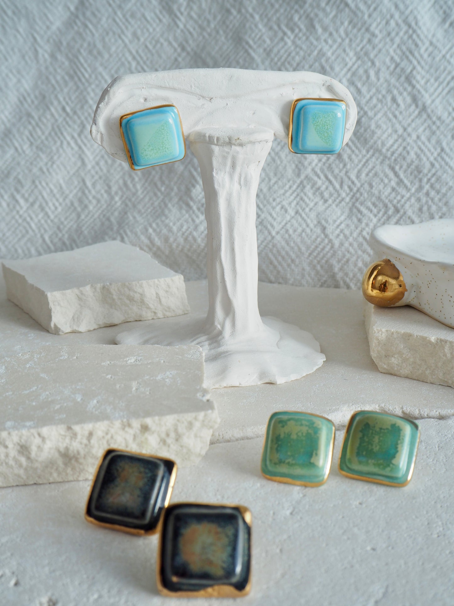 “il Quadrato” Medium Handmade Porcelain Studs coloured with “Sky Blue&Sage” glossy glazes with 24k Gold lustre details