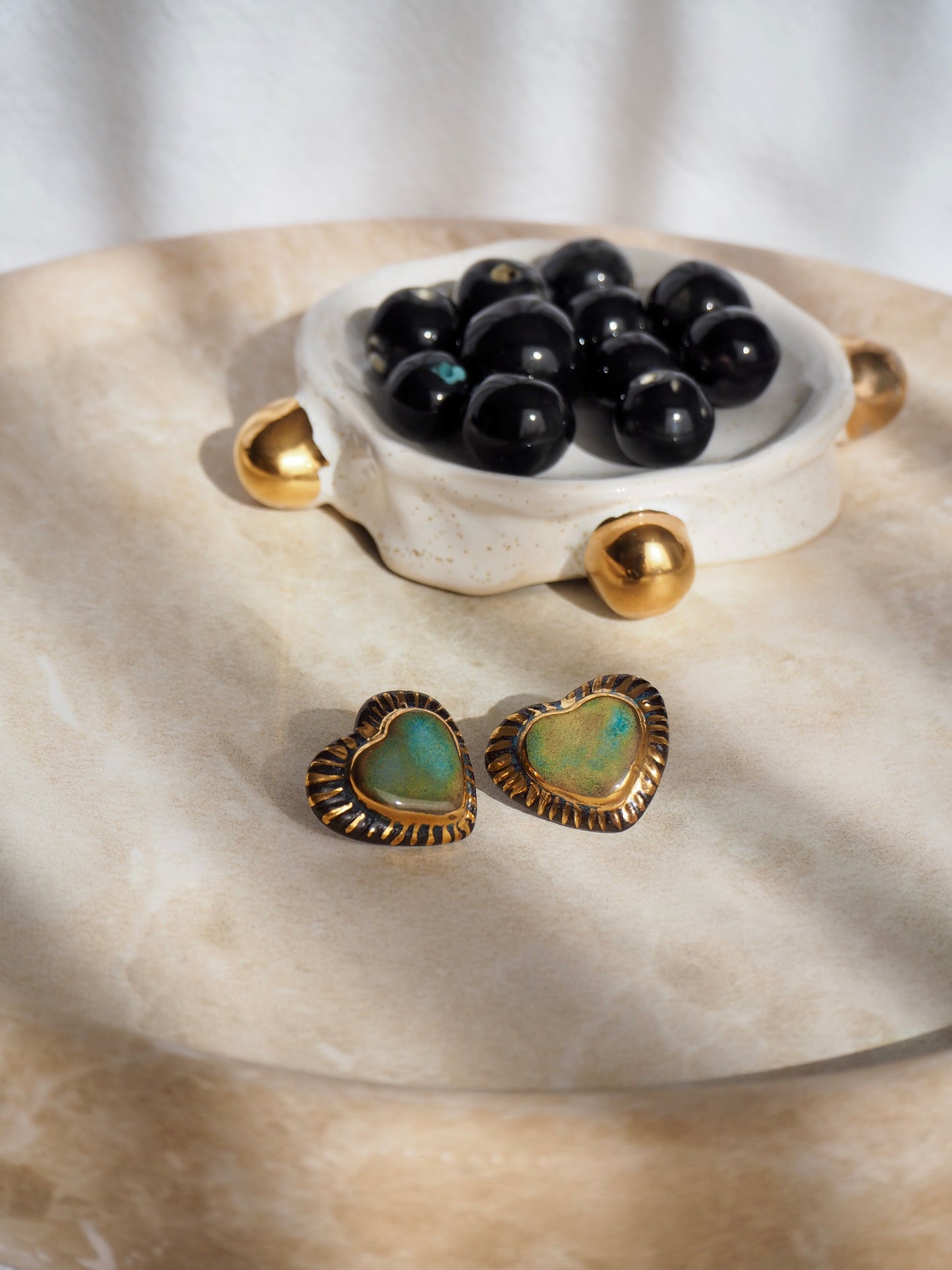Black Clay Heart Earrings with blue glossy glazes & 24k Gold lustre rim
