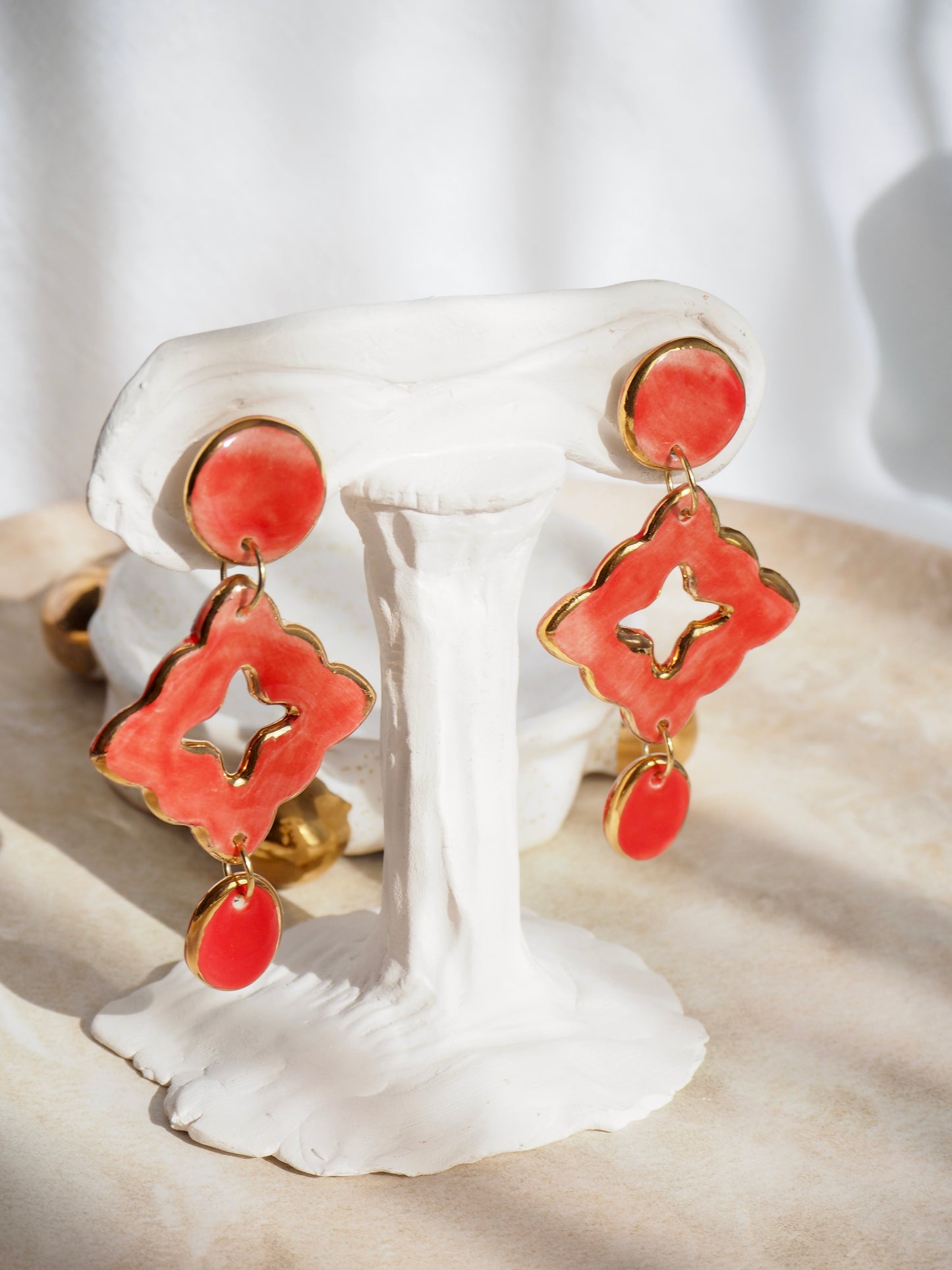 “A Feast for your Eyes” Handmade Porcelain Earrings in Warm Red  coloured glaze with 24k gold lustre details.