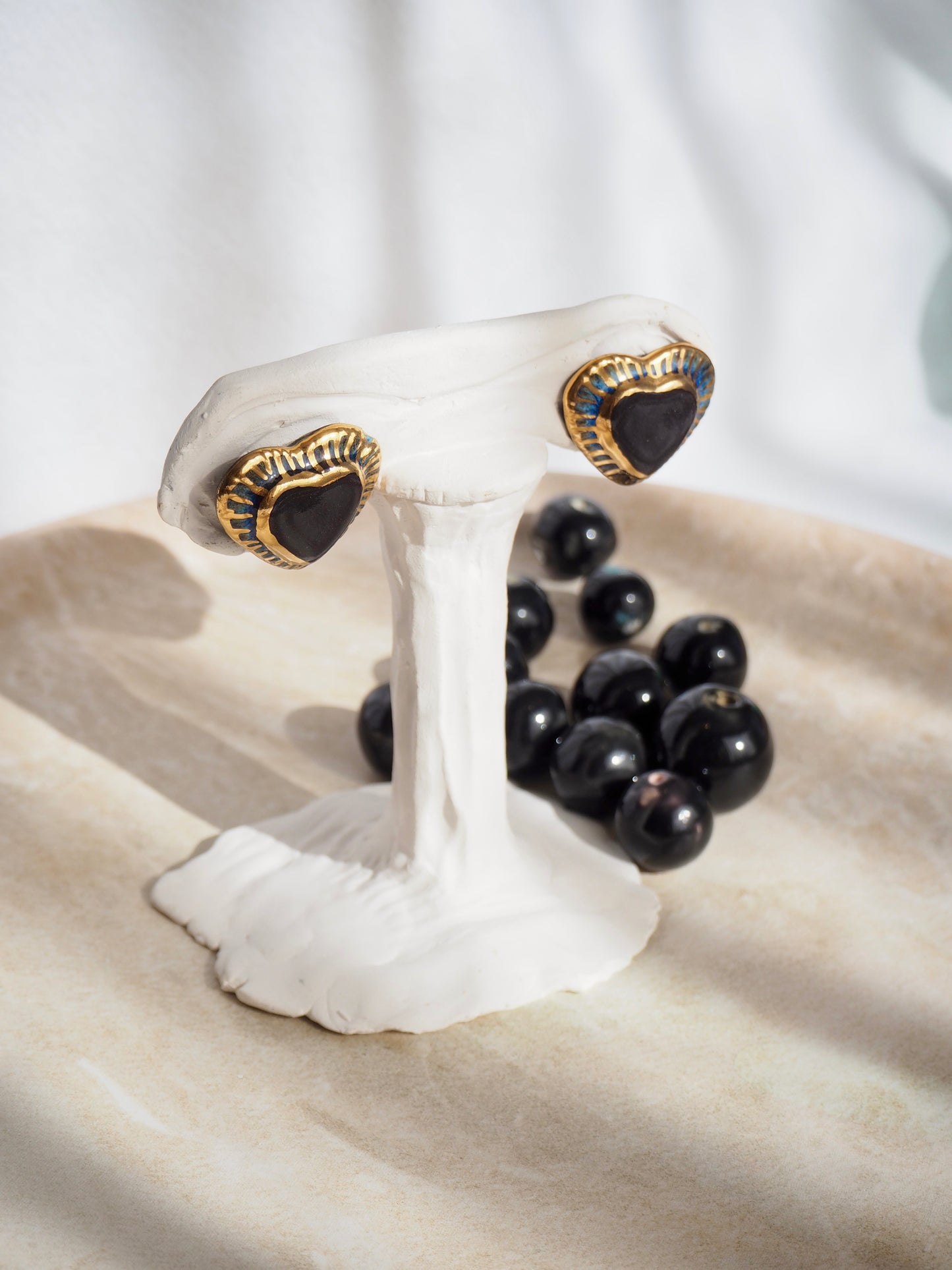 Black Clay Heart Earrings with blue glossy glazes & 24k Gold lustre rim