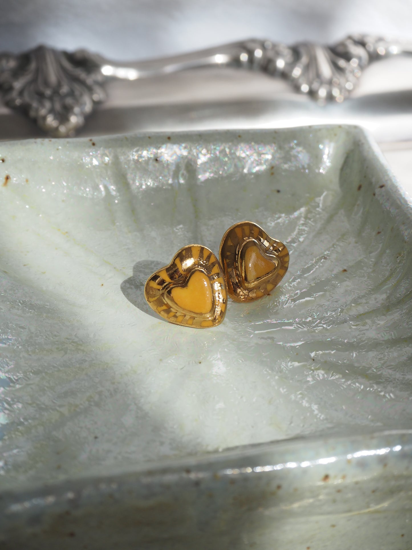 Small Handmade Porcelain Heart Stud coloured with “Mustard Yellow” glossy glaze with 24k Gold lustre rays