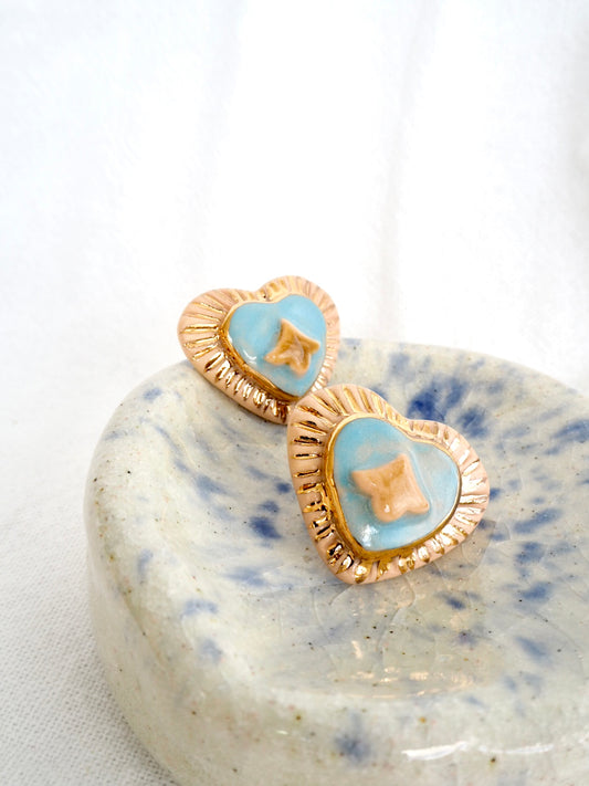 Porcelain Heart Earrings in “Parchment” coloured underglaze & Blue pearl glaze with 24k Gold lustre hand painted details